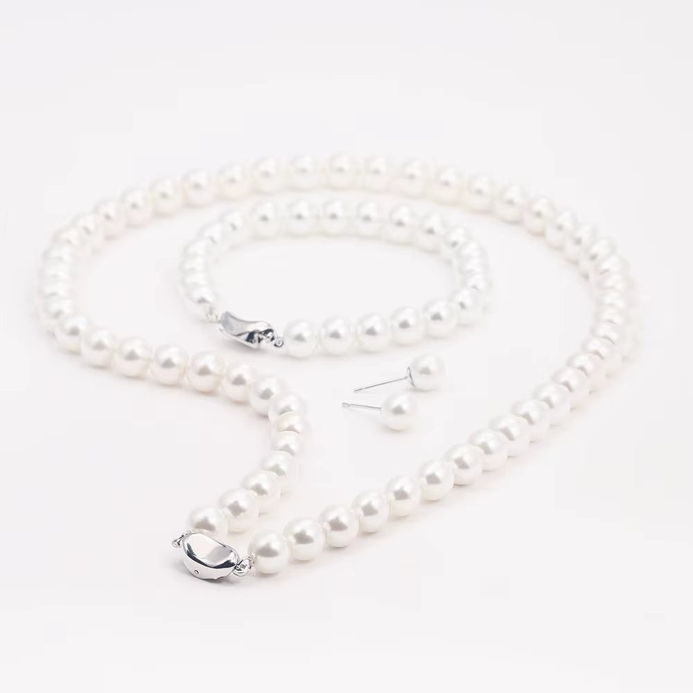 Elegant 4-Piece Women's Pearl Jewelry Set - Necklace, Earrings, and Bracelet for Timeless Style